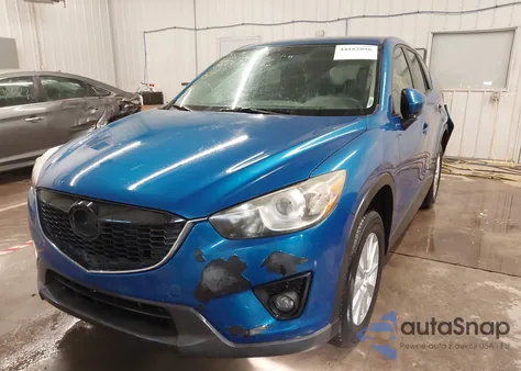 2014 Mazda Cx-5 Touring z USA, uszkodzony, nr VIN JM3KE2CY2E0374650